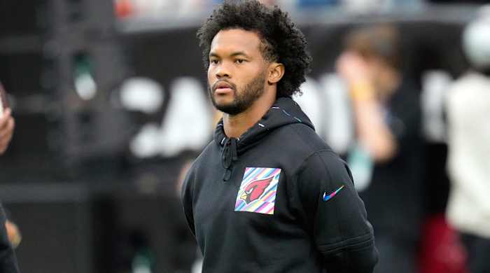 FILE - Arizona Cardinals quarterback Kyler Murray pauses on the field prior to an NFL football game against the Cincinnati Bengals, Oct. 8, 2023, in Glendale, Ariz. The Cardinals are awaiting Murray's return from a knee injury that prematurely ended his 2022. (AP Photo/Ross D. Franklin, File)